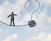 Illustration of man walking on tight rope with a question mark ending.